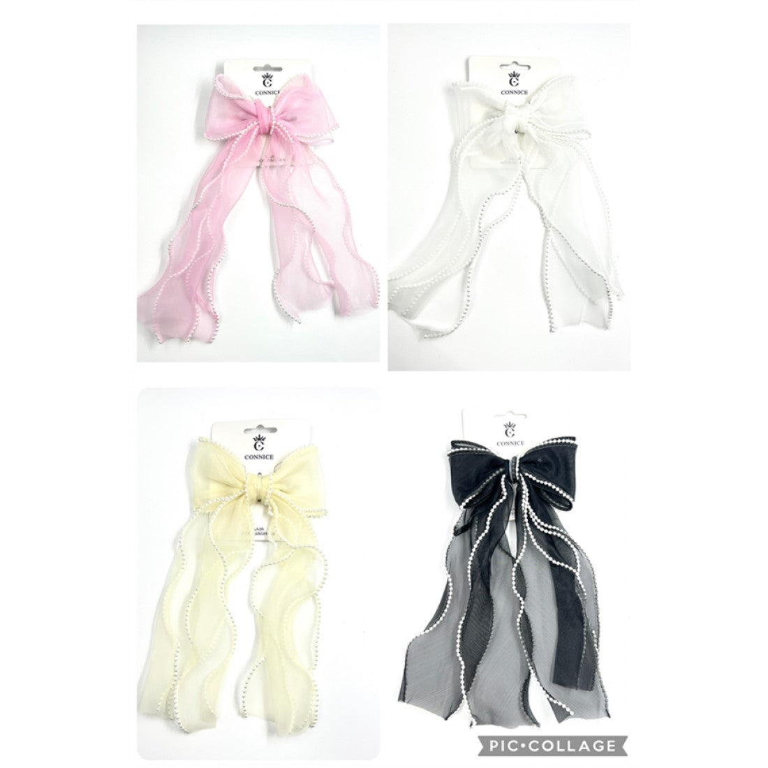 Large sheer fabric bow with long ribbon tails; Pearl-style beading along the ribbon edges; Packaged on branded backing card; Shown in multiple colours including pink, white, cream and black;