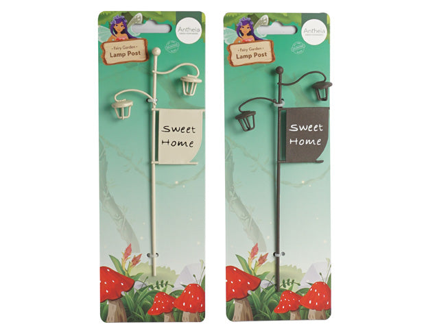 metal lightpost with two lanterns; small rectangular flag with 'Sweet Home' text; available in cream colour; available in dark brown colour; mounted on light green card with fairy garden design;