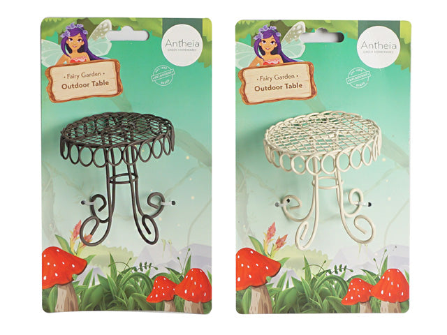 metal material; intricate looped tabletop design; three curved legs; available in black and white finish; packaged on illustrated card with fairy theme;