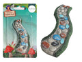 curved pebble path shape; mixed coloured pebbles (white, blue, brown, black); green textured edging resembling grass; plastic blister packaging with branded card backing;