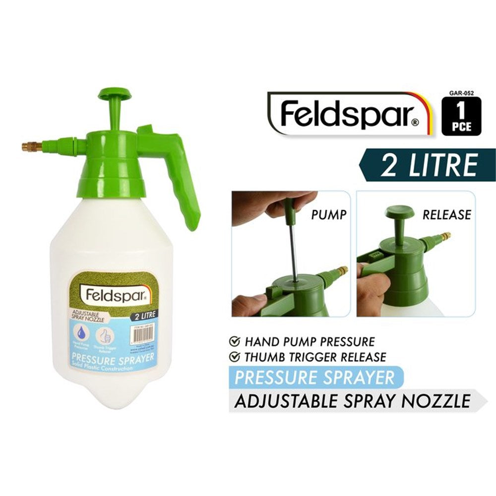 white semi-opaque plastic tank; green plastic pump and handle; brass spray nozzle tip; label with brand and product details; hand pump and thumb trigger;