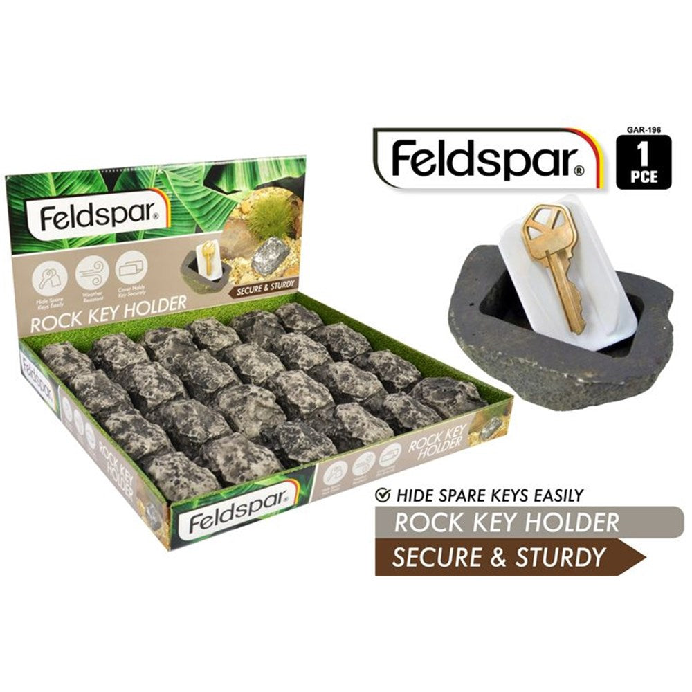 grey rock shaped holder; white plastic insert for keys; natural stone texture; display box with multiple units; single piece packaging marked '1 PCE';