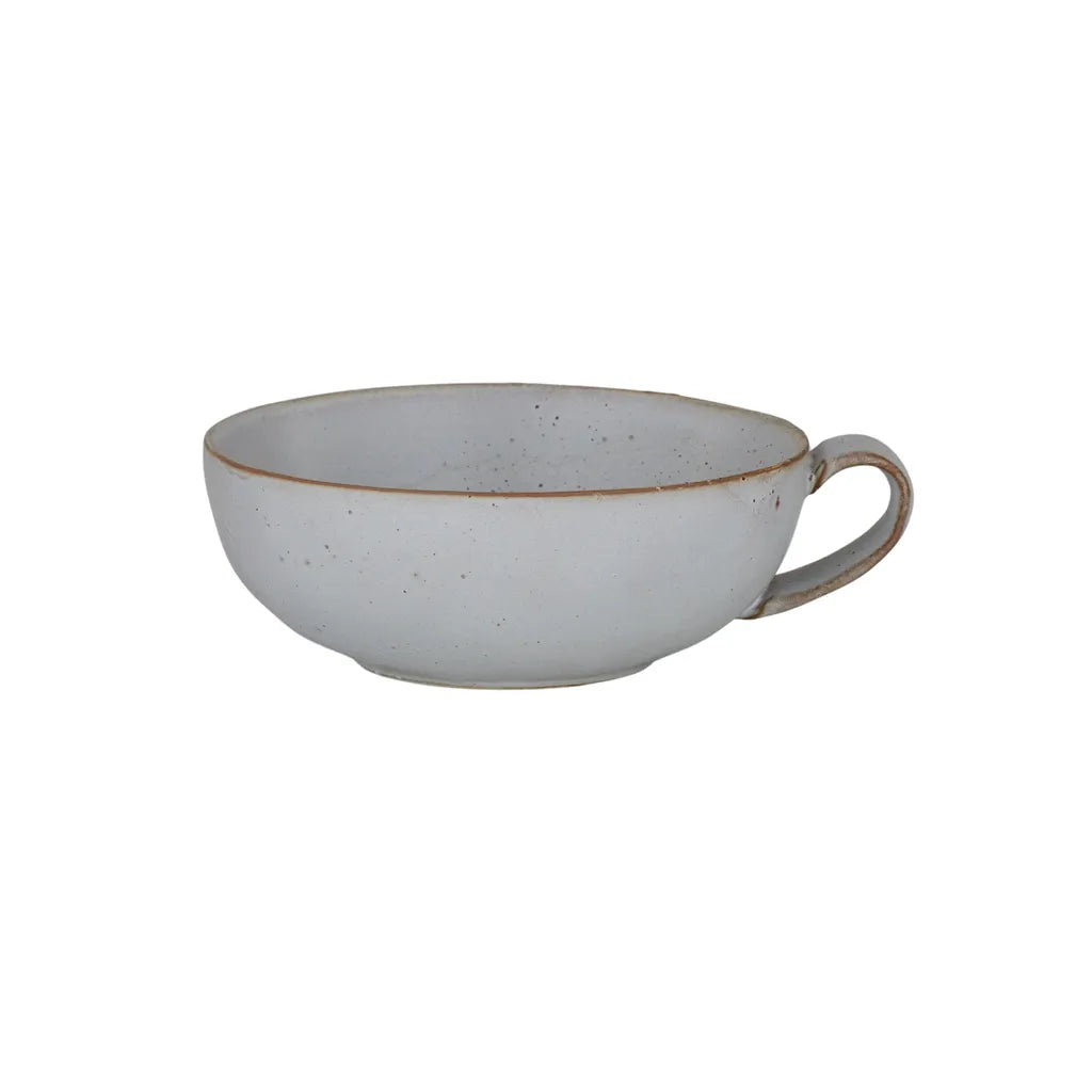 speckled light grey ceramic; rustic edge trim; round bowl shape; single handle; matte finish;