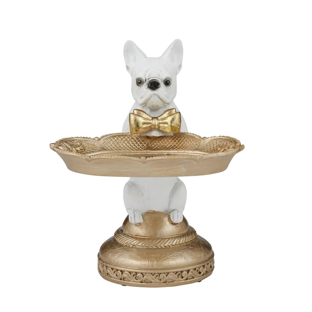 white Frenchie dog figure; gold decorative tray held by dog; gold bow tie on dog; ornate gold circular base; resin material finish;