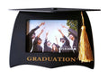 Black graduation cap shape; Gold tassel attached to top corner; Gold 'GRADUATION' text at base; Holds a 6x4 inch photo;