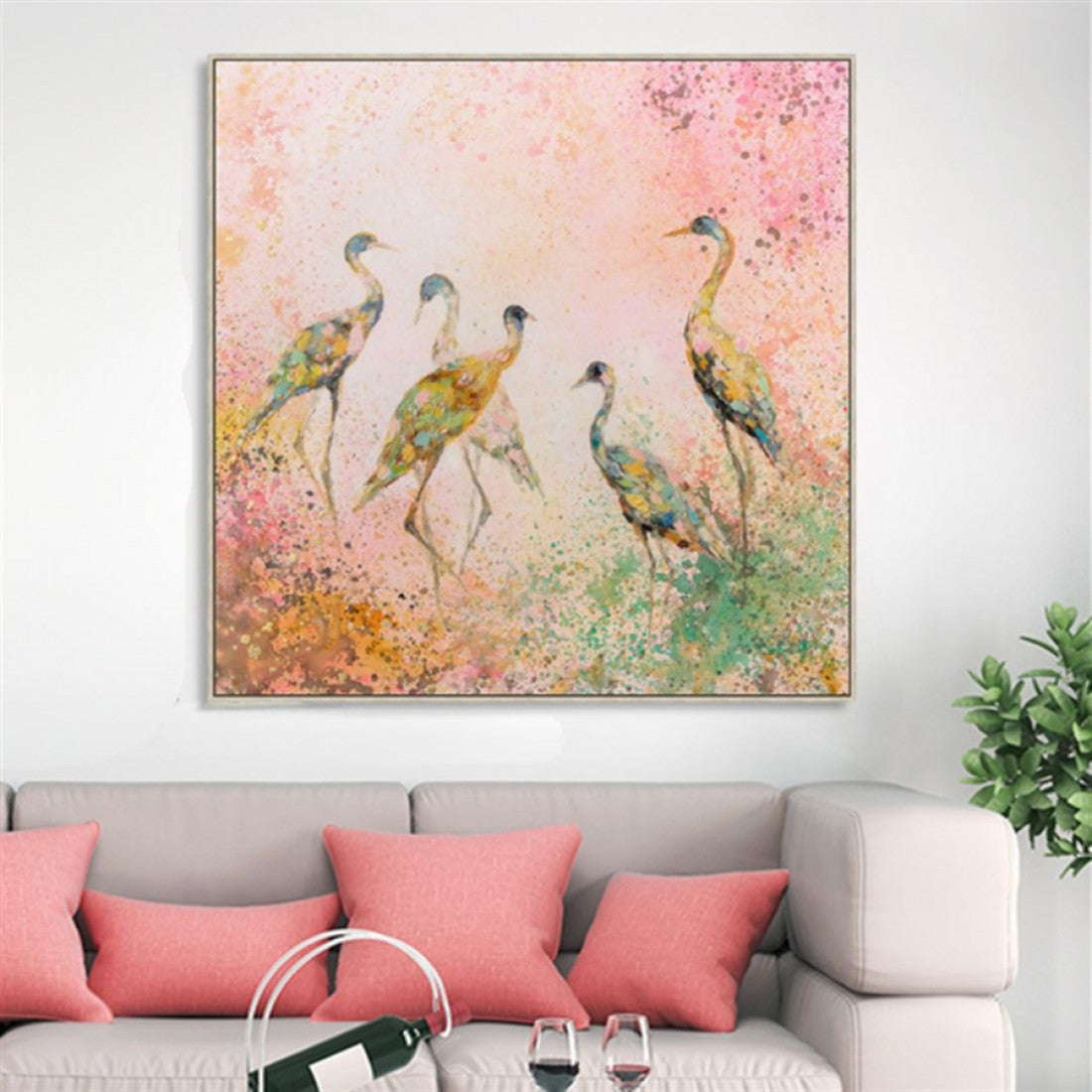 square canvas with frame; pastel pink and green colour palette; depiction of six birds; splattered paint background; framed print with slim profile;