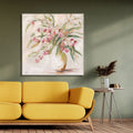 square canvas print; floral design with pink flowers and green leaves; neutral-toned frame; soft colour palette; canvas thickness approximately 4.5cm;