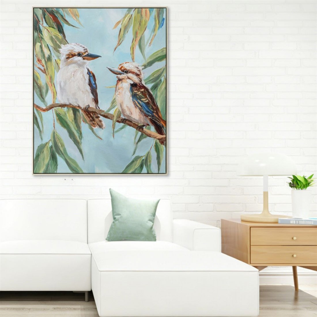 hand painted canvas; kookaburra birds on branch; soft blue background; green eucalyptus leaves; framed canvas with depth;