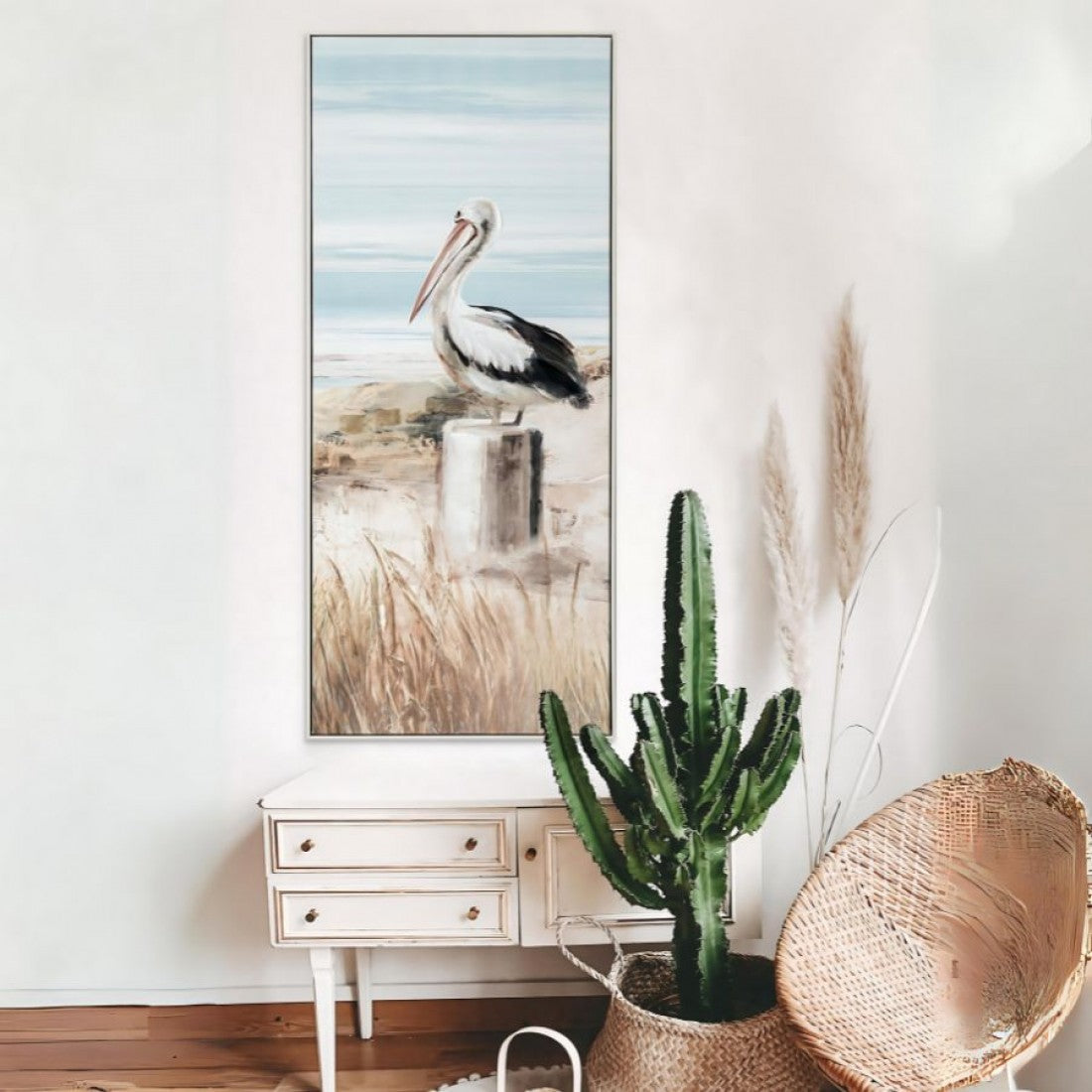 vertical rectangular canvas print; pelican bird artwork; soft coastal colour palette; white frame around canvas;