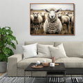 canvas print of sheep with detailed wool texture; polystyrene frame in brown colour; natural colour tones with sheep and field background; rectangular shape, 50x70 cm size;