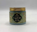 blue jar with gold lid; decorative label with floral pattern; black label with gold and white text;