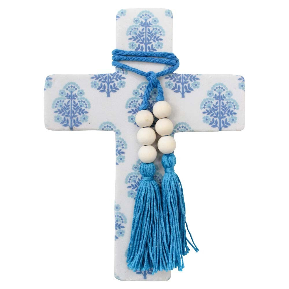 blue and white patterned cross shape; bold blue rope wrapped at top; six large white wooden beads on rope; blue tassels hanging from beads; cross dimensions approximately 16x22cm;