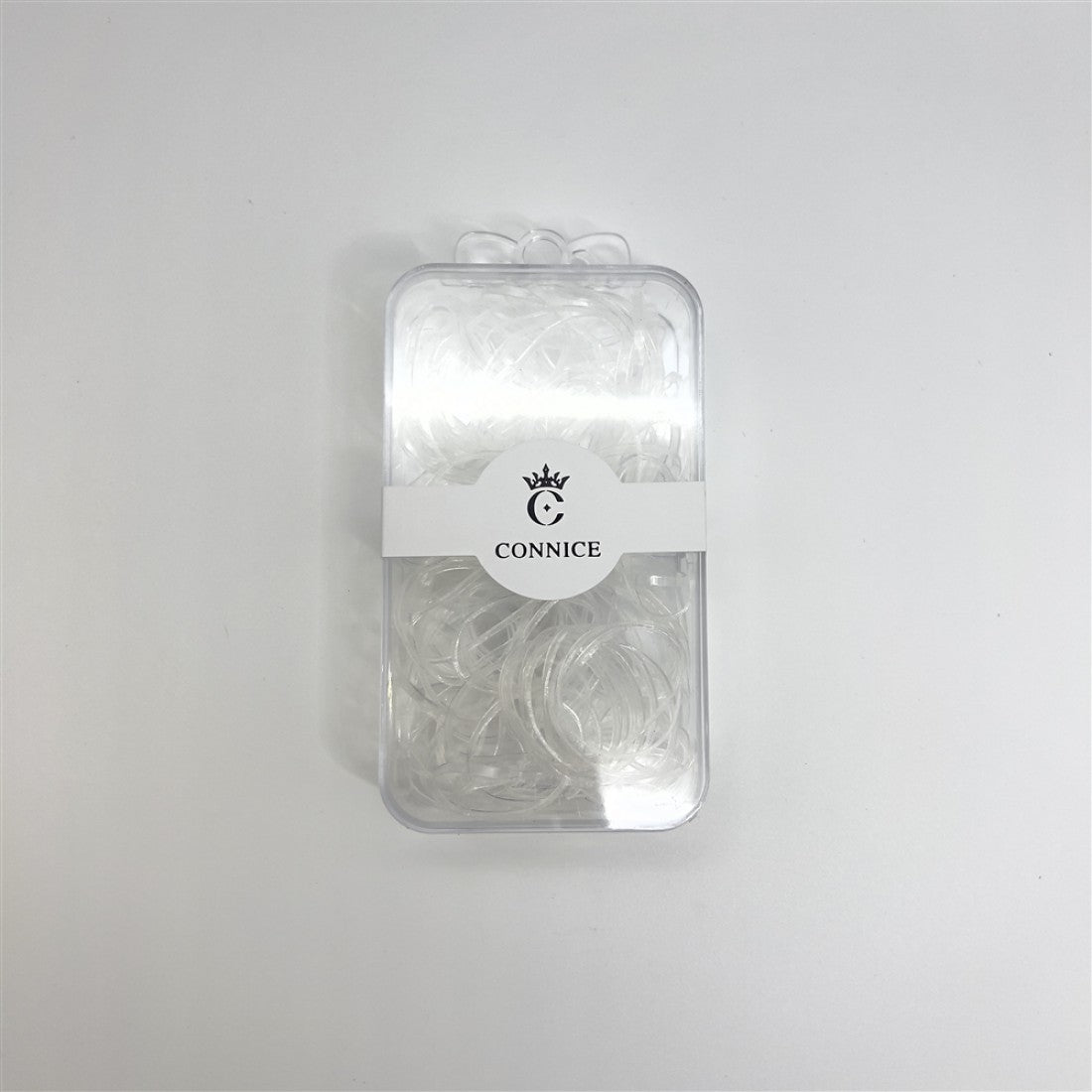 Clear elastic hair bands; Rectangular clear plastic case; White band label with CONNICE branding; Compact, portable packaging;