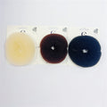 Round mesh donut-shaped hair rings; Three colours shown: light blond, brown and dark (black/navy); Packaged on white backing cards; Textured, sponge-like material;