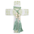 resin material with textured surface; sage green mandala pattern; boho-style green tassels with wooden beads; large cross shape; light, natural colour palette;