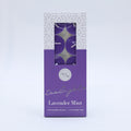 purple wax tealights; pack of 10; rectangular purple and white box; window on packaging showing tealights;