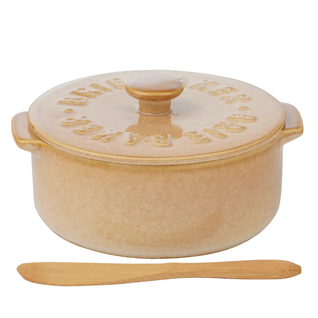 Natural beige ceramic material; Round shape with two small side handles; Fitted lid with knob and embossed lettering; Includes wooden spreader; Compact dimensions around 13.5x16x7.5cm;