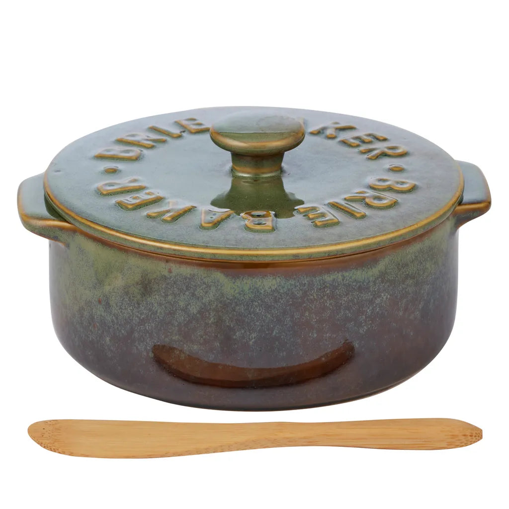 Olive green ceramic finish; Round shape with two side handles; Includes matching ceramic lid with knob; Comes with wooden spreader;