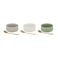 Two ceramic bowls with accompanying small spoons; Bowls are round shaped with a height and diameter of approximately 10x5cm; Bowls shown in three different colours: beige, white and light green; Each spoon has a golden finish and elongated handle;
