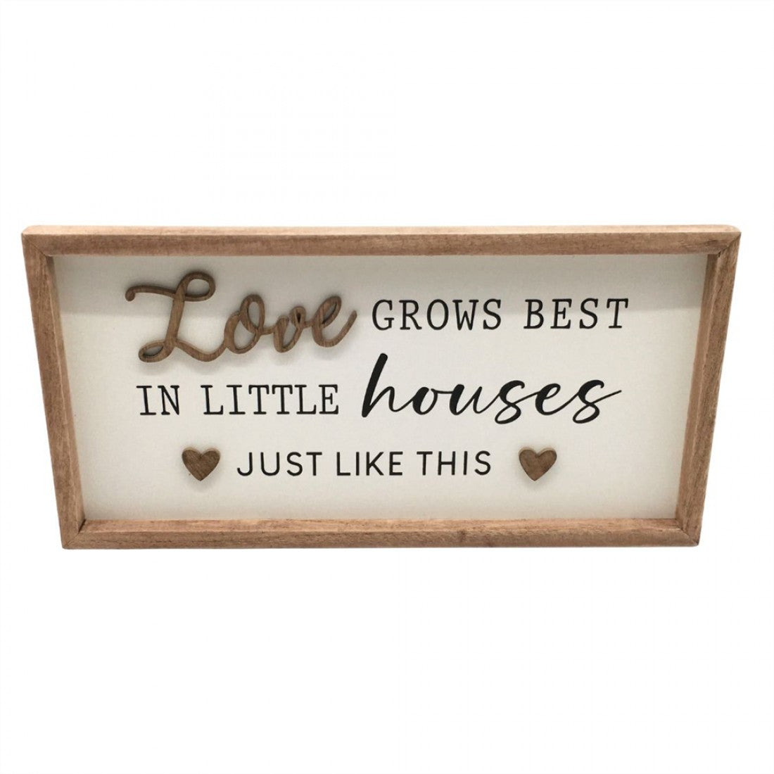 Rectangular wooden plaque with light timber frame; White background with black and wood-tone text; Raised wooden word "Love" and two small heart shapes; Quote reads "Love grows best in little houses just like this";