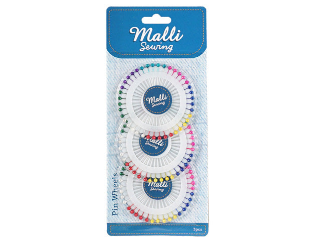3 round white plastic pin wheels; assorted colourful pearl pin heads; blue and white packaging card; brand name Malli Sewing visible; pins arranged neatly around wheels;