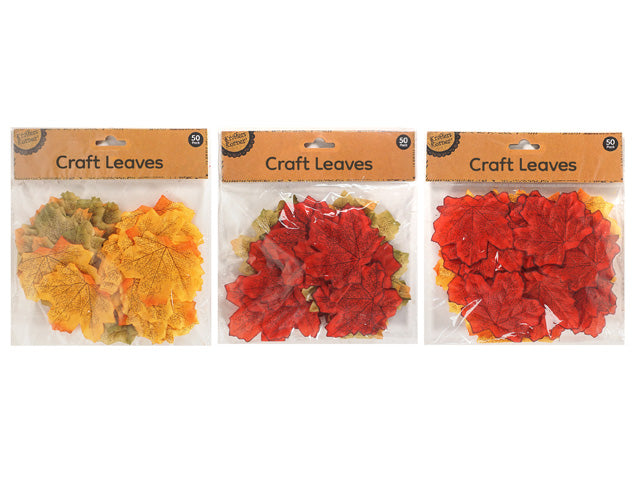 Pack contains 50 maple leaf-shaped pieces; Leaves in assorted autumn colours: red, orange, yellow and green; Packaging shows 'Craft Leaves' label on brown header card; Leaves display detailed vein patterns mimicking real maple leaves;
