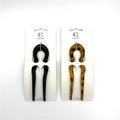 U-shaped two-prong hair pins; One matte black pin and one brown tortoiseshell-style pin shown; Smooth plastic-look finish; Supplied on white branded backing card;