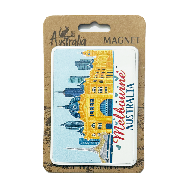 rectangular metal magnet; illustration of Melbourne buildings; yellow and blue colour scheme; packaged on brown backing card; hanging hole for display;