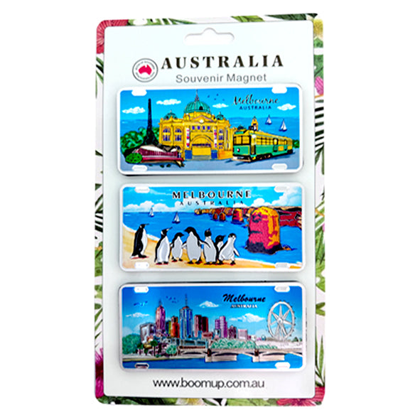 three rectangular number plate magnets; colourful illustrations of Melbourne landmarks and wildlife; packaged on floral background card; each magnet shaped like a vehicle number plate;