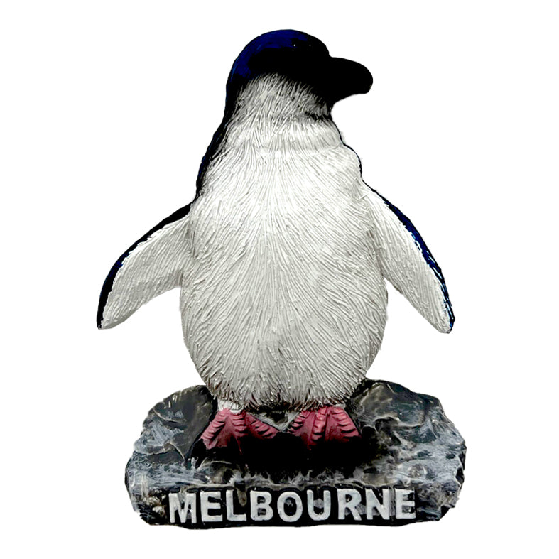 resin material; penguin figure; white and black colour with pink feet; base labelled 'MELBOURNE'; textured surface detail;