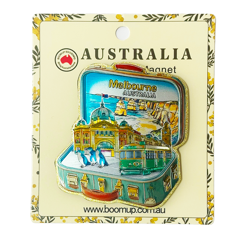 Suitcase shaped magnet with Melbourne landmarks; PVC material with embossed details; Multicoloured with gold edging; Mounted on cream card with floral border;