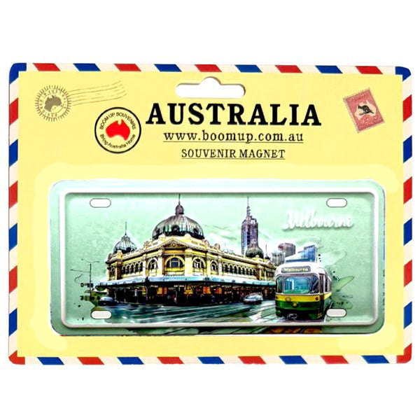 rectangular number plate shape; colourful illustration of Melbourne landmarks; includes four mounting holes; packaged on branded backing card; magnet style number plate;