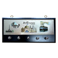 rectangular wooden base; five metal hooks; metal plaque with Melbourne landmarks; two metal wall hanging loops; dark wood colour base;