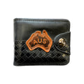 black faux leather material; brown embossed Australia map emblem; button snap closure; woven texture pattern on lower half;
