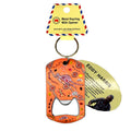 rectangular metal keyring with bottle opener cutout; decorated with orange and brown Aboriginal style artwork; attached round silver keyring; packaged with labelled card including artist info;