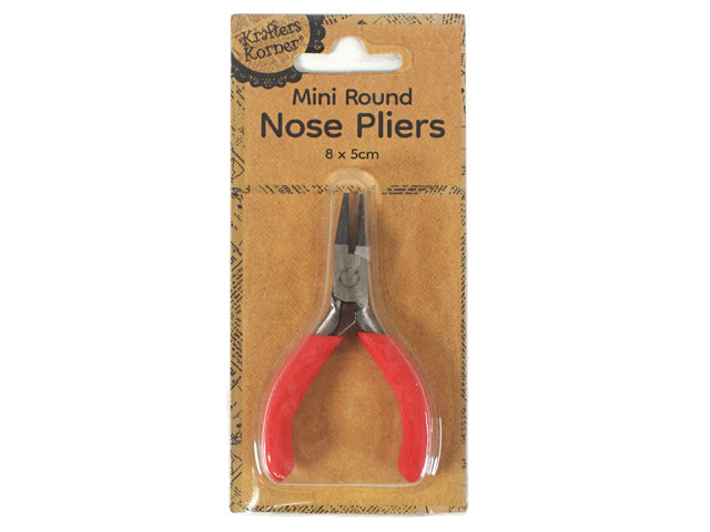red cushioned handles; metal round nose tips; compact size; packaged on brown cardboard backing;
