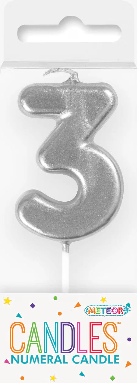 Silver numeral '3' candle; Glossy metallic finish; Stick base for cake placement; Approximately 8cm tall; Packaging with colourful 'Meteor Candles' label;
