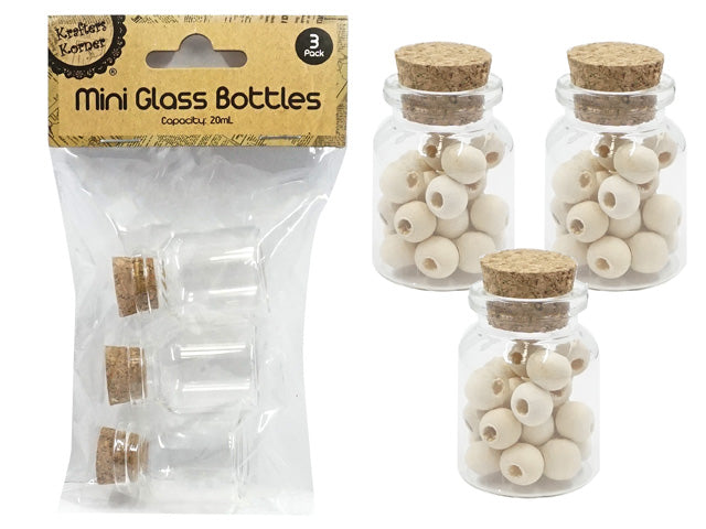 Clear squat glass bottles; Cork stoppers; Small size 20ml; Pack of three bottles; Natural cork colour;