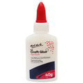 white plastic squeeze bottle; red pointed twist cap; product label with brand and weight; 40g content;