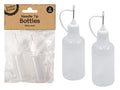 set of two bottles; clear translucent plastic; white screw caps; attached cap covers on needle tips; fine black needle tips;