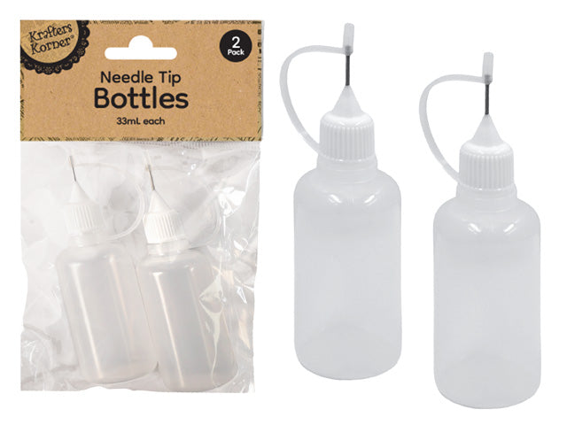 set of two bottles; clear translucent plastic; white screw caps; attached cap covers on needle tips; fine black needle tips;