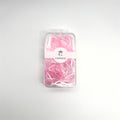 Clear rectangular plastic case with lid; Brand label reads "CONNICE" with crown logo; Mix of pink and white small elastics; Compact, travel-friendly packaging;