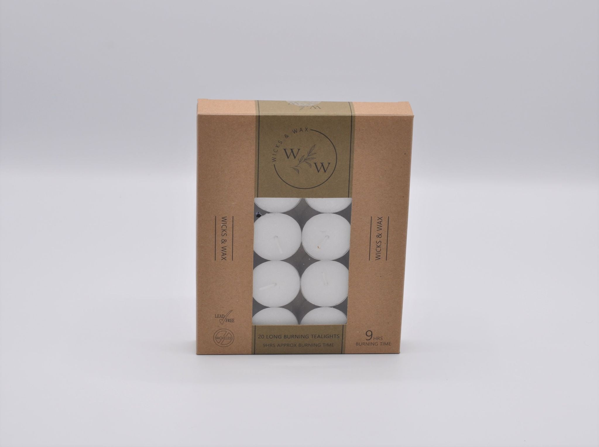 20 white tealight candles; packaged in a brown cardboard box with clear window; 9 hours burn time labelled on box; lead-free and smokeless icons visible; brand name Wicks & Wax;