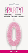 pink colour; glitter finish; numeral 0 shape; approximately 8cm tall; single candle packaging;