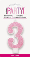 pink glitter finish; number 3 shape; white candle base; 8cm height; packaged on white card;