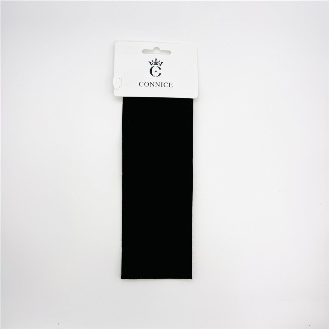 Black wide fabric strip styled as a headband; Presented on a white branded backing card; Plain, unpatterned design; Rectangular shape suggesting 7cm wide band;