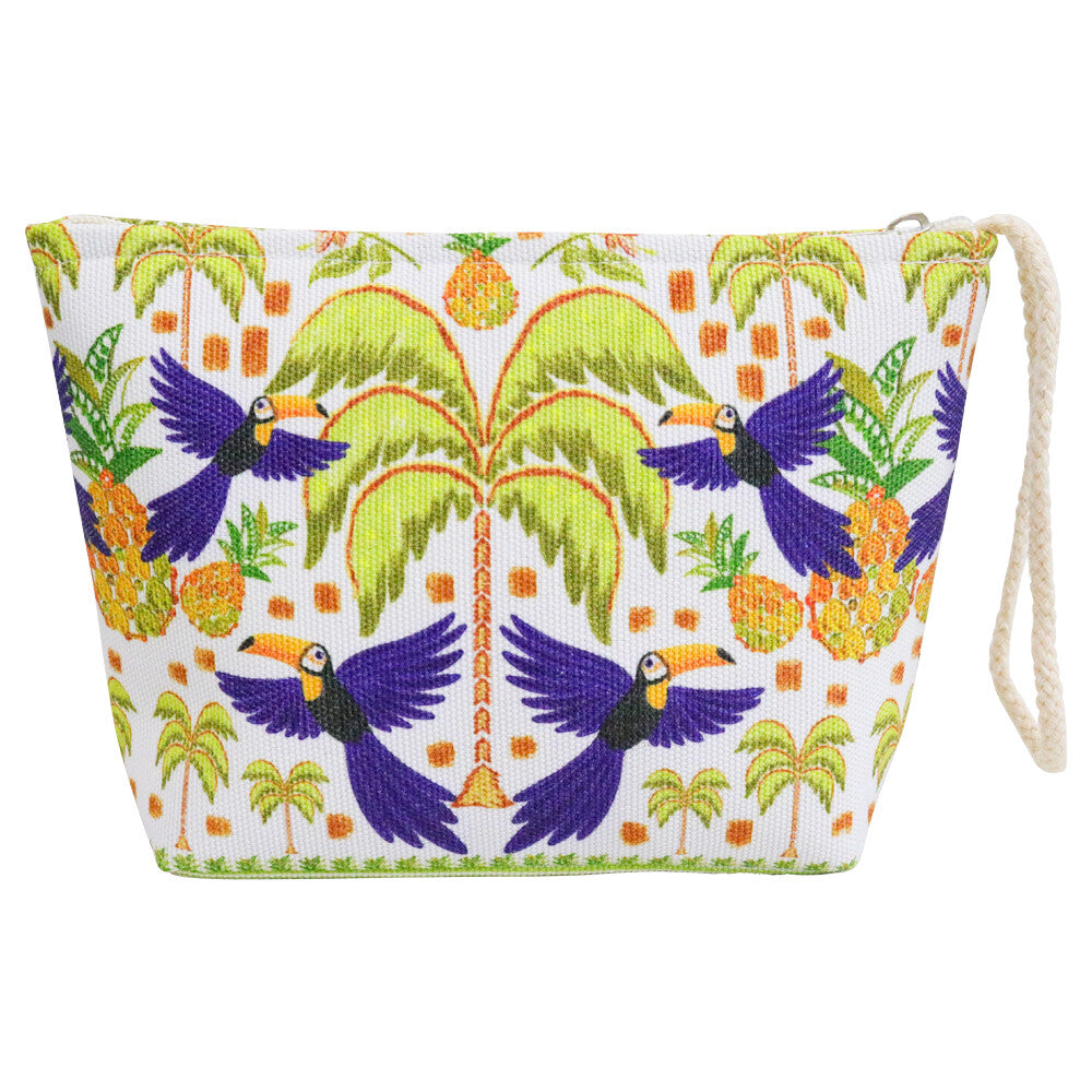 White canvas base fabric; Tropical print with purple toucans; Green palm trees and yellow-orange pineapple accents; Braided wrist strap attached to zipper top closure; Compact trapezoid shape;