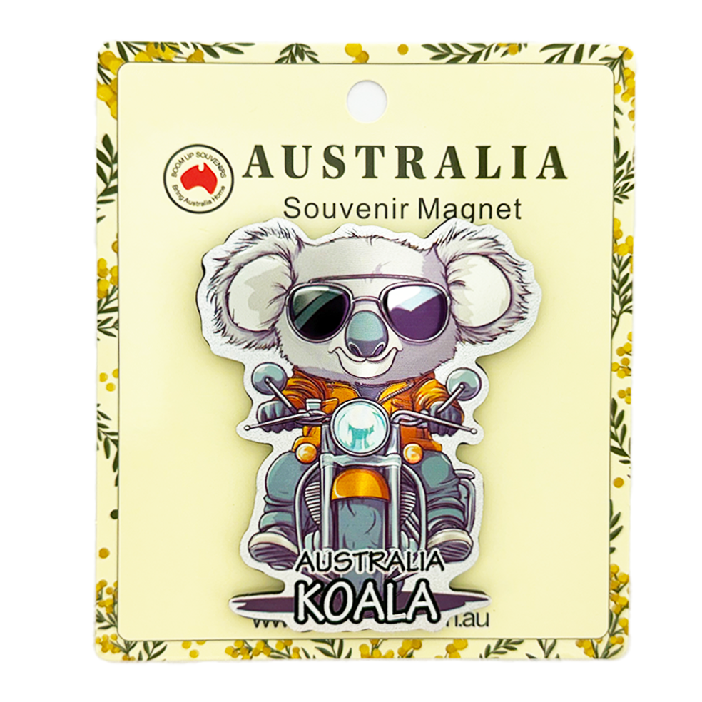 PVC magnet shaped like a koala; Koala wearing sunglasses and orange jacket; Koala riding a motorbike; Yellow card backing with floral edge design; Text on magnet reads 'AUSTRALIA KOALA';