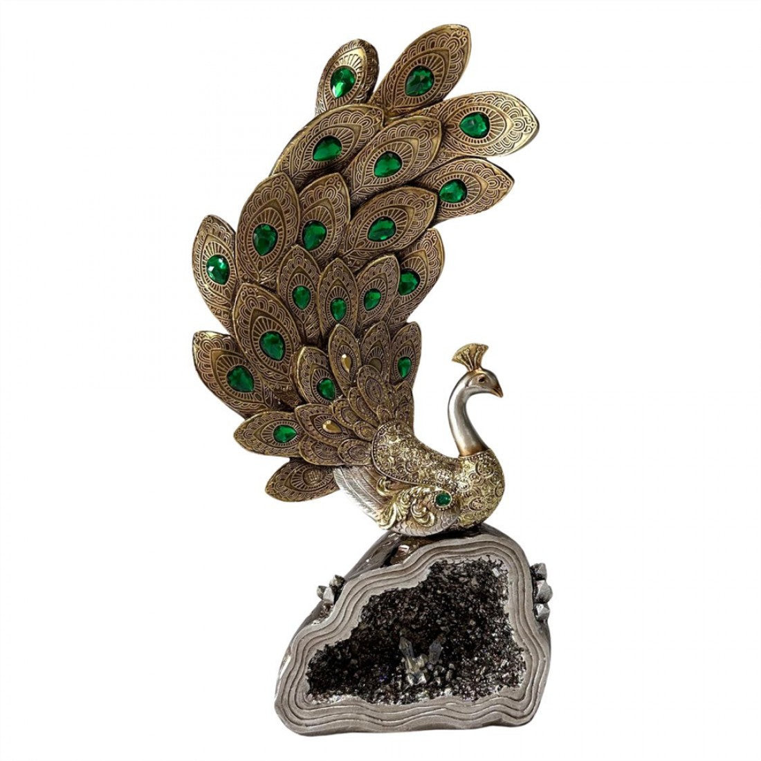 Gold-toned peacock figure with detailed feather pattern; Green gem-style accents on tail feathers and body; Silver and gold tones on the peacock body; Rock-like grey base with dark, glittering geode-style centre;