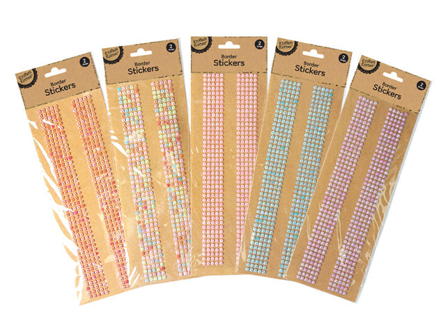 Two parallel strips of rhinestones per pack; Available in multiple pastel colours including pink, blue, purple, peach, and mixed; Packaged on brown cardboard backing with clear plastic cover; Compact rectangular packaging size; Rhinestones are uniform size and shape;